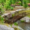 Outsunny 7' Metal Arch Garden Bridge with Safety Siderails, Decorative Arc Footbridge with Delicate Scrollwork "S" Motifs for Backyard Creek, Stream